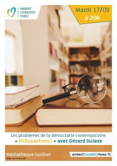Une loupe posée sur des livres